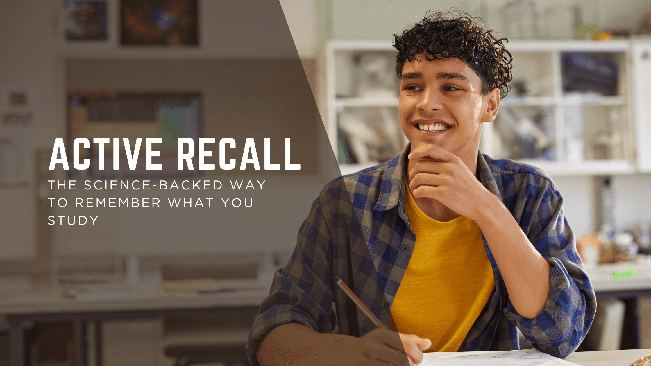 Student sitting in a classroom and using active recall technique to remember what he studied.
