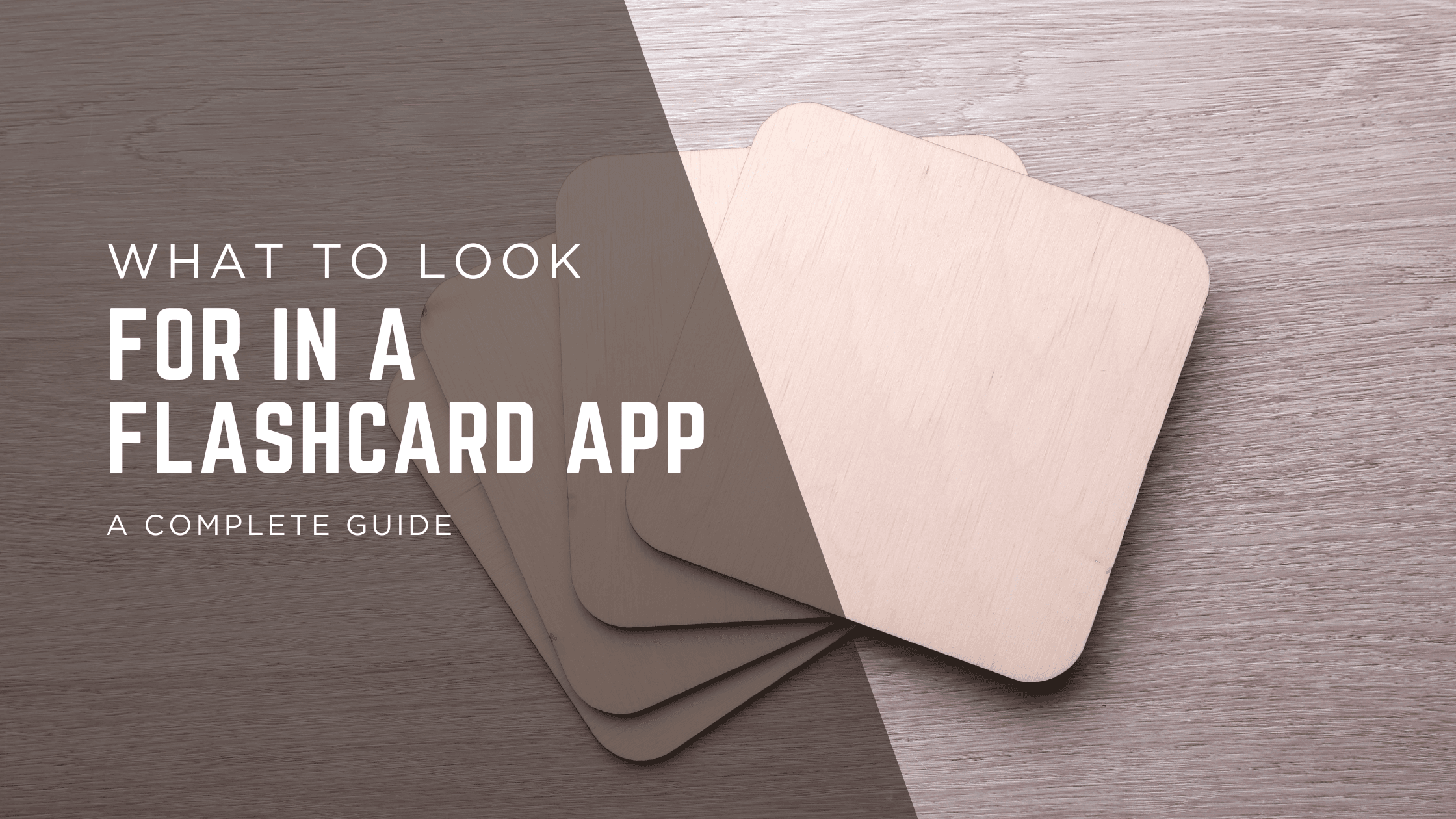 Image showing flashcards on a desk along with the text "What to Look for In a Flashcard App."